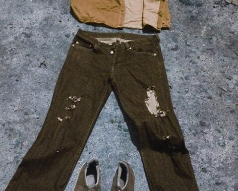 men's clothes on pavement