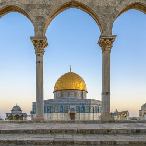 Dome of the Rock in Jerusalem seen through arches