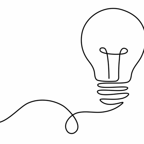 Line drawing of a light bulb against white background