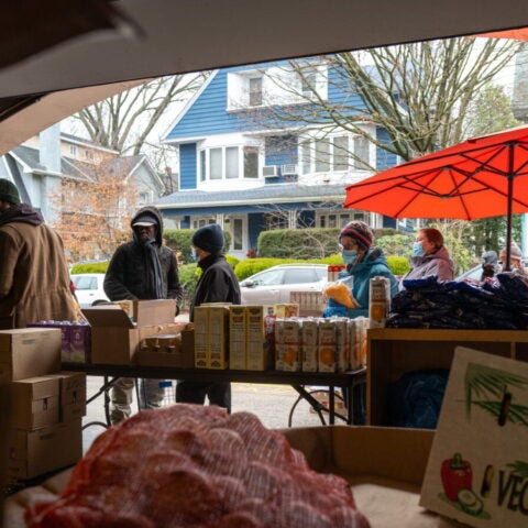 A weekly food bank in New York City. The author argues that research on food and housing insecurity is critical to preventing illness and enhancing health. Spencer Platt/Getty Images
