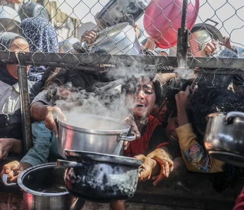 Palestinians at a food distribution point in Khan Younis, Gaza, 30 May 2025. Photograph: Anadolu/Getty Images
