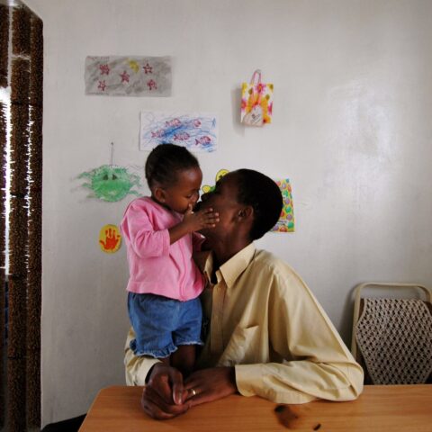 Edwin Motse, an HIV-positive Aids activist in Botswana with his daughter Ompi, who is HIV-negative thanks to modern preventive techniques. At the turn of the century HIV had almost doubled mortality rates among children under five. Photograph: Peter Van Agtmael/Polaris/eyevine