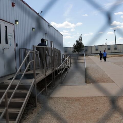 Immigrants seeking asylum walk at the ICE South Texas Family Residential Center, on Aug. 23, 2019, in Dilley, Texas. (AP Photo/Eric Gay, File) (Copyright 2019 The Associated Press. All rights reserved.