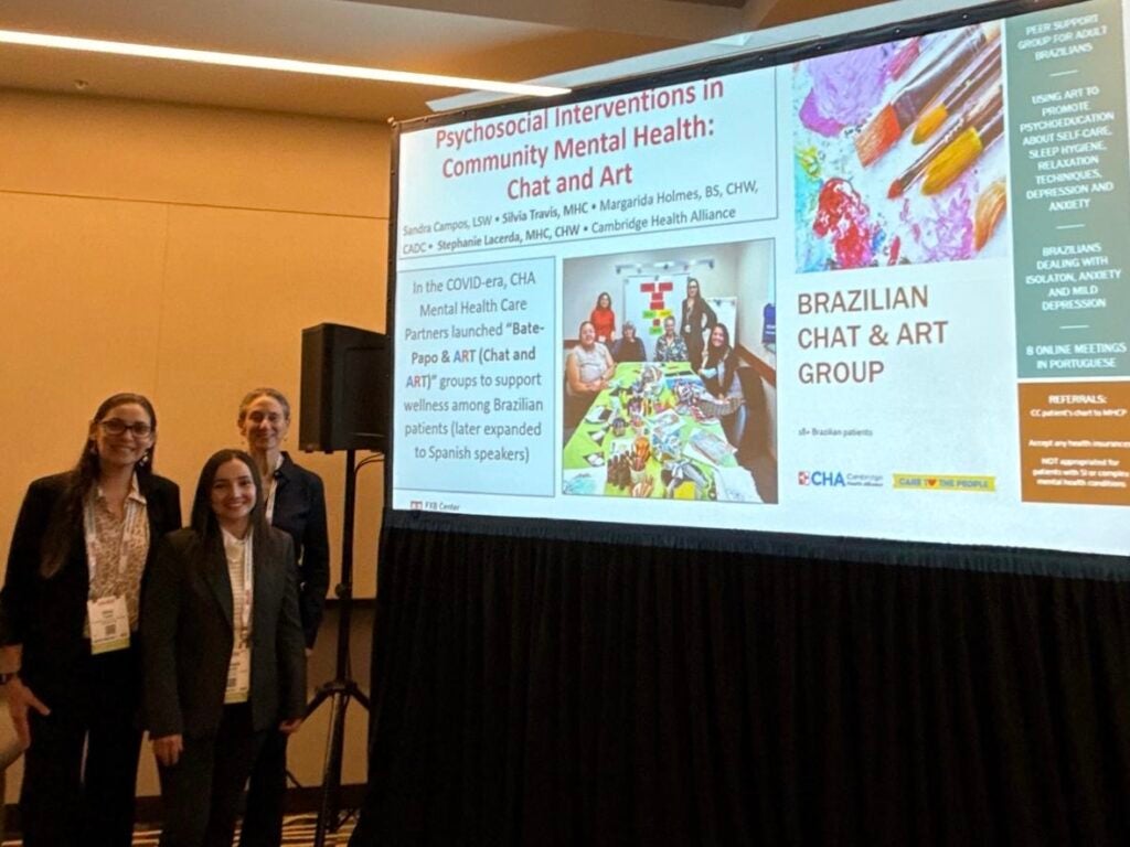 Dr. Margaret Sullivan and research collaborators posing with one of their session slides during the 2025 APHA Annual Meeting in Washington, D.C.