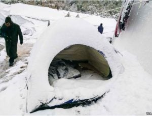 tent covered in snow