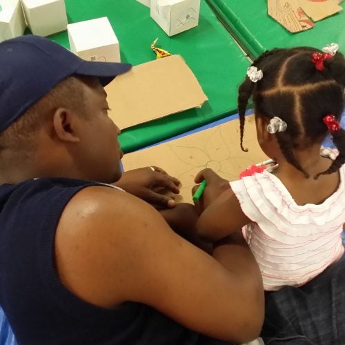 A father with his daughter in Lynne's parent-and-child group