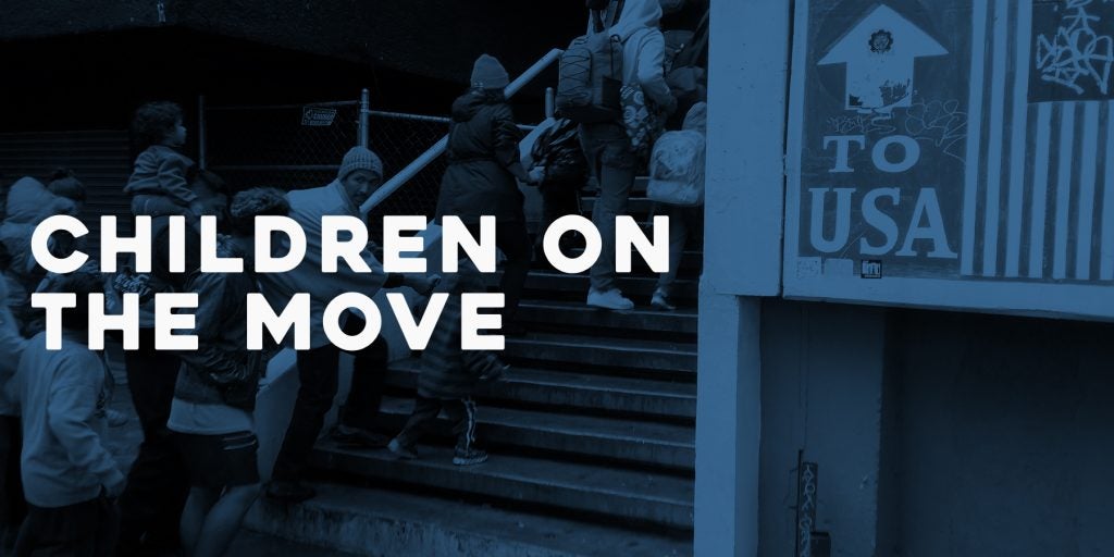 Children on the move heading against image of people walking up concrete staircase outdoors. A blue filter was applied to the photograph.